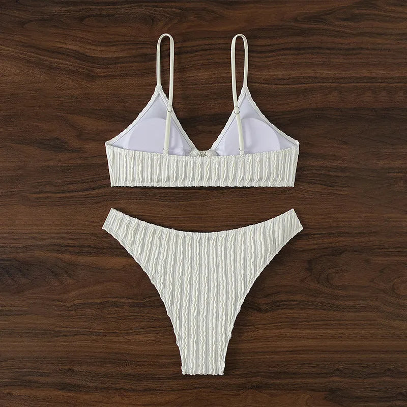White women's V-neck swimsuit with split style and sleeveless design for swimming activities