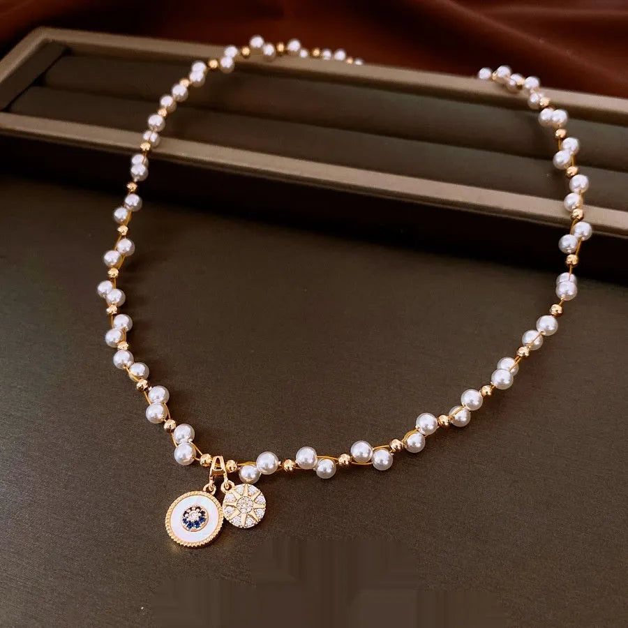 Gold electroplated necklace with round pearl pendant on adjustable 41-50cm clavicle chain