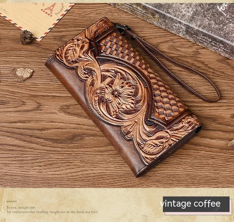 Women's brown embossed floral genuine leather tri-fold wallet showing interior compartments