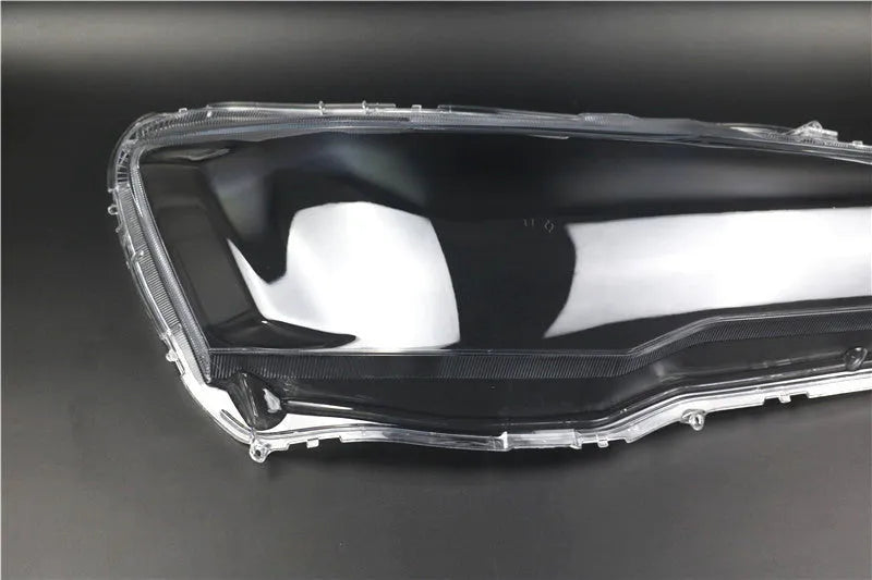 Transparent plastic headlight housing cover with 50mm×30mm×20mm dimensions for vehicle lamp replacement