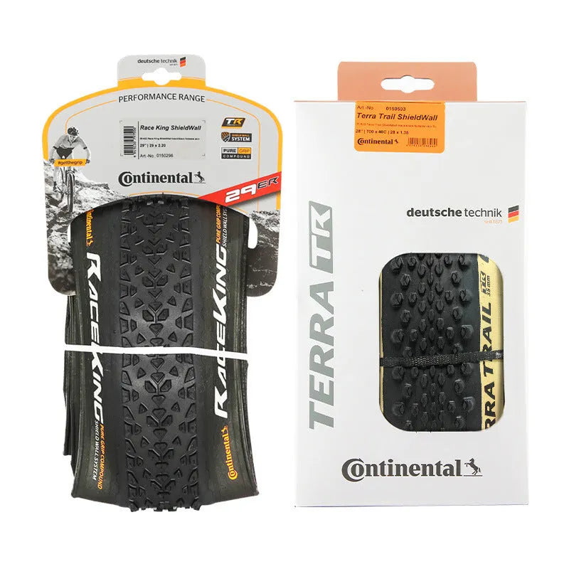 Mountain bike folding outer tyre showing tread pattern and sidewall in yellow or white options