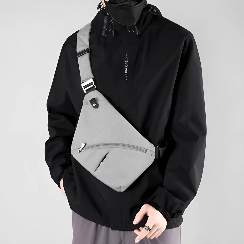 Men's oxford cloth chest bag in black or grey with left or right shoulder carrying options