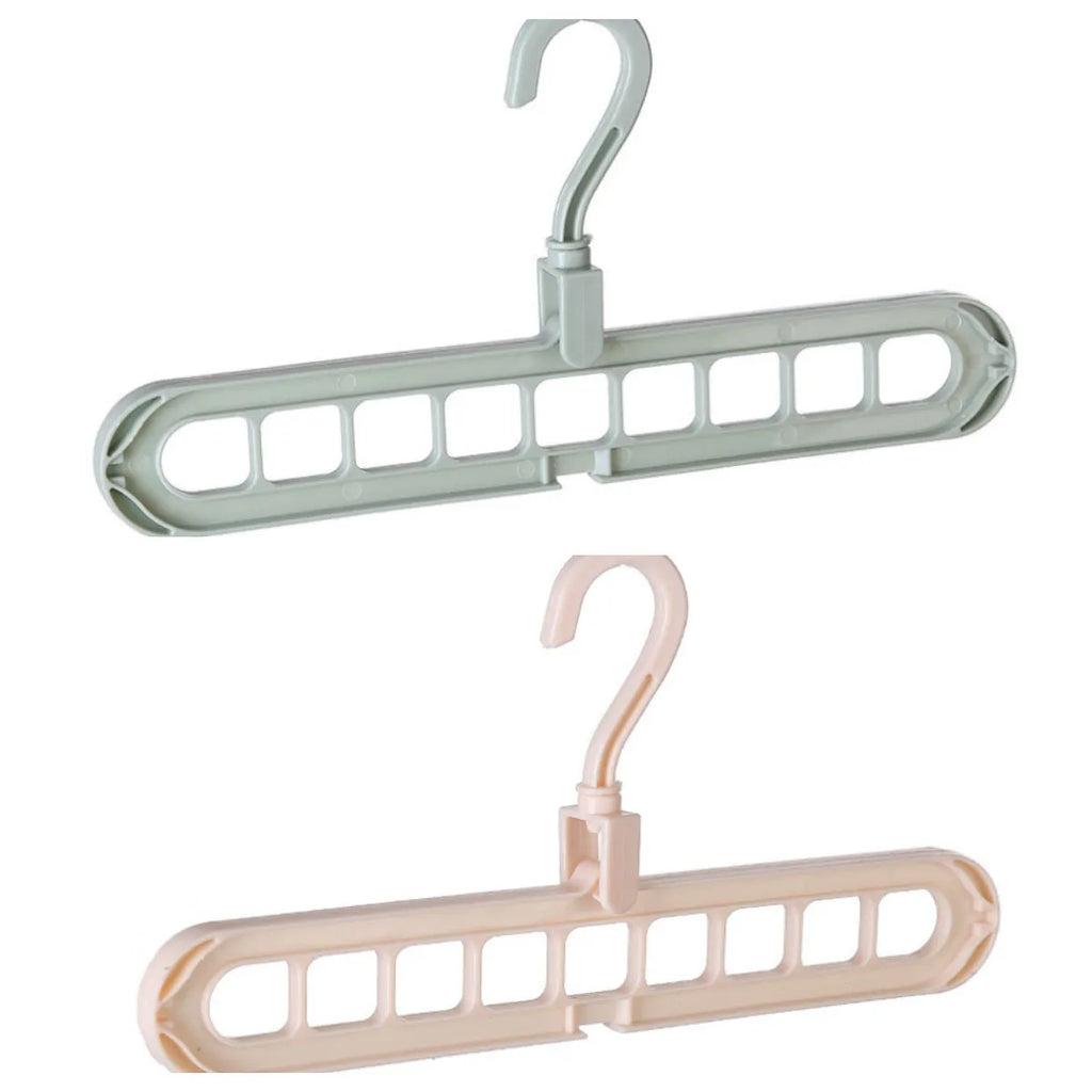 Plastic clothes hanger with rotating hook in pink or green colour for heavy garment storage