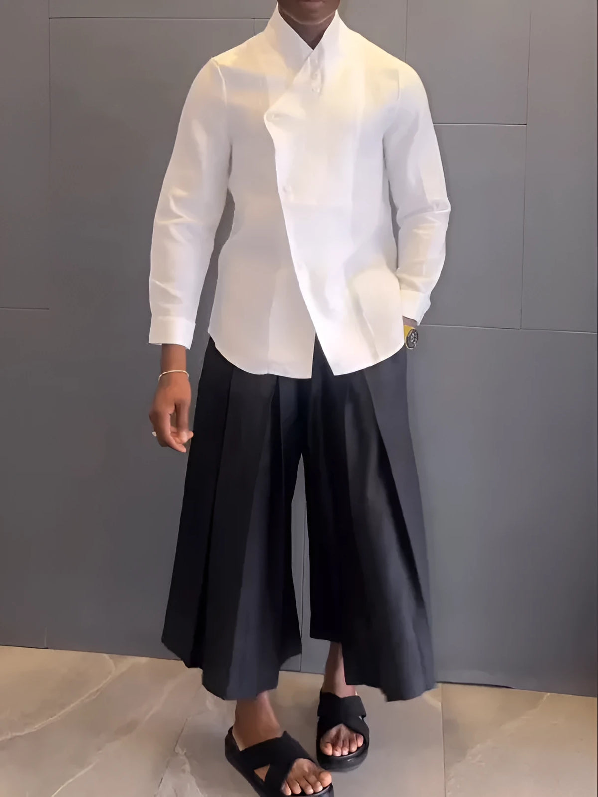 White asymmetric-front long-sleeve shirt and black pleated trousers women's casual set