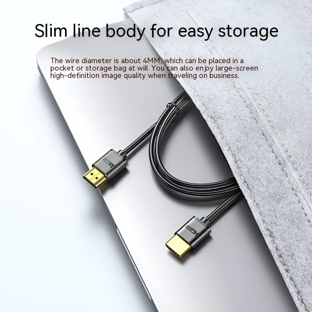 Flexible HDMI video cable with gold-plated connectors, shown in a hairline finish, suitable for computers and projectors.