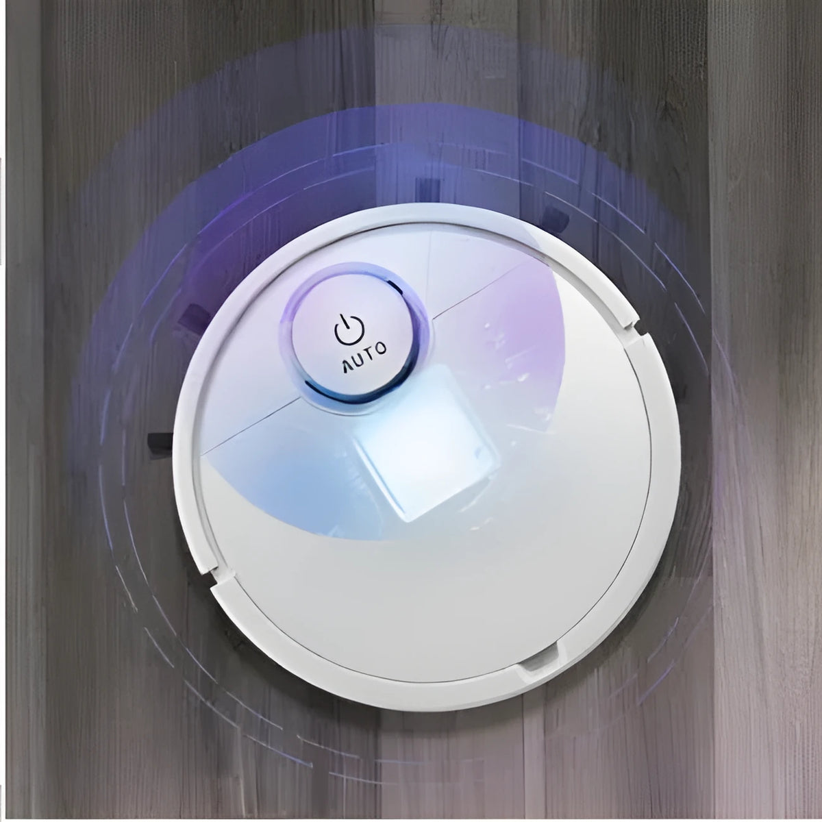 Compact white automatic sweeping robot on a wooden floor