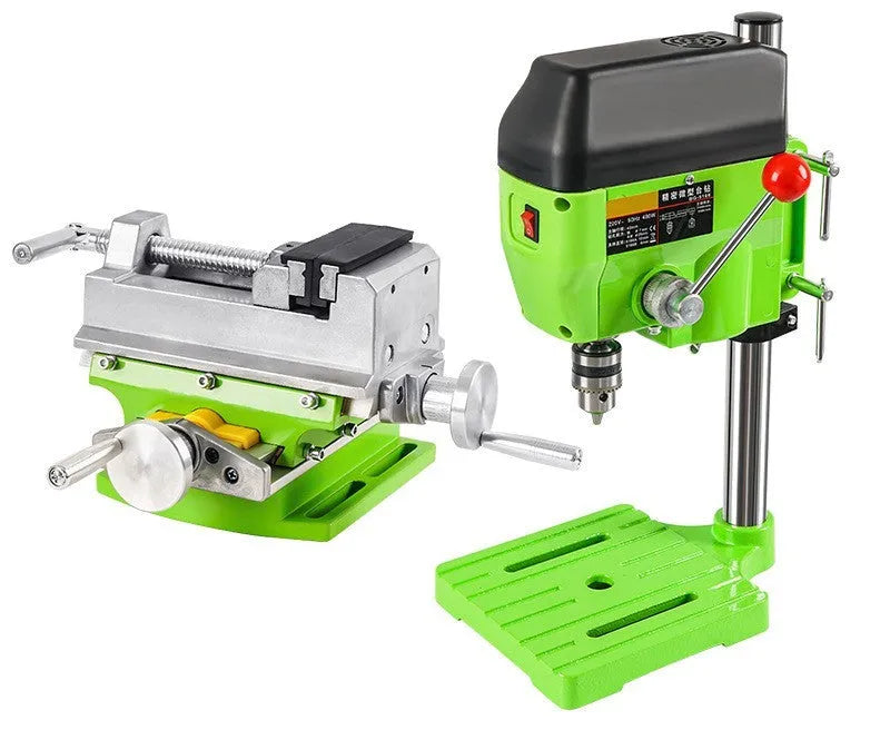 Bench drill and milling machine with cross bench pliers on workshop bench