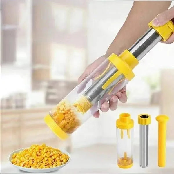 Yellow cylindrical corn stripper kitchen tool with stainless steel components on a kitchen worktop.