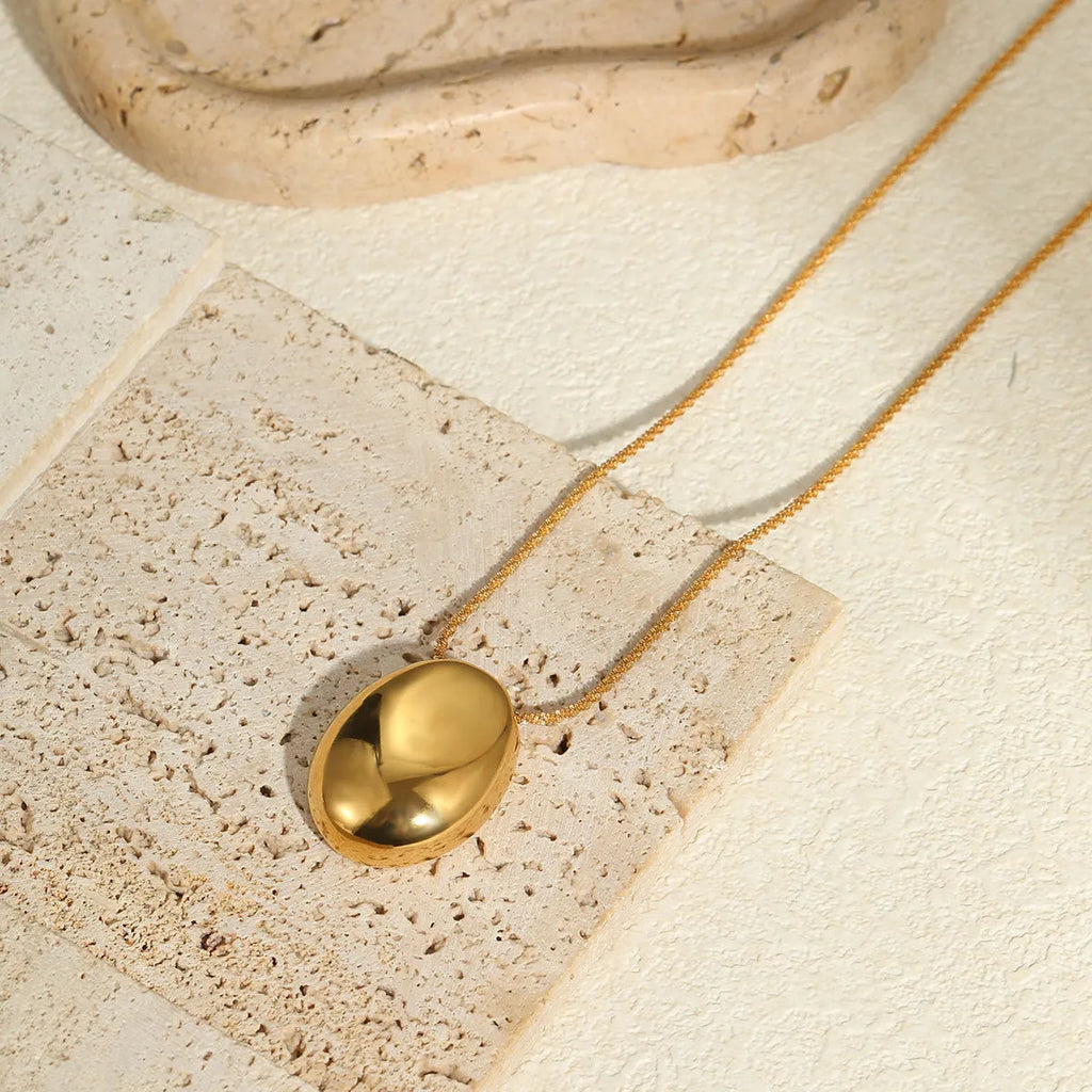 Gold plated stainless steel geometric pendant necklace with adjustable chain 41cm to 50cm length