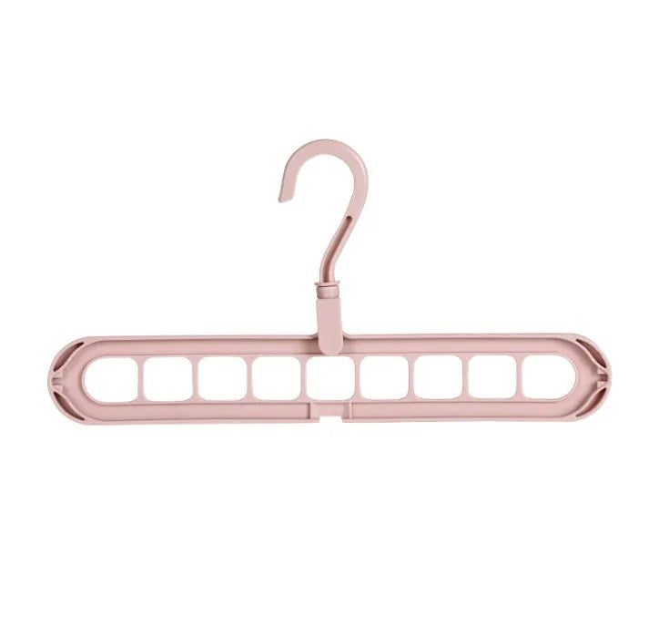 Plastic clothes hanger with rotating hook in pink or green colour for heavy garment storage