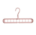 Plastic clothes hanger with rotating hook in pink or green colour for heavy garment storage