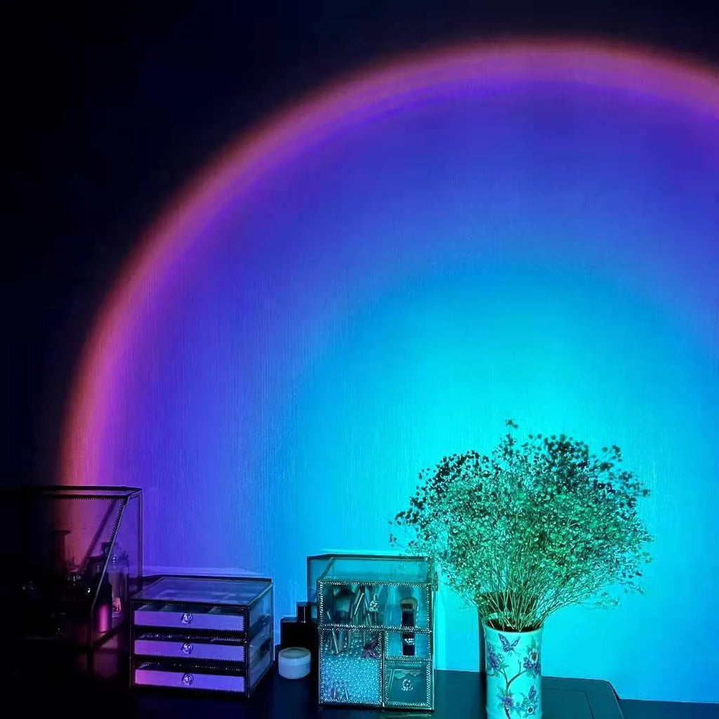 Rechargeable rainbow projection lamp showing sunset red colour effects