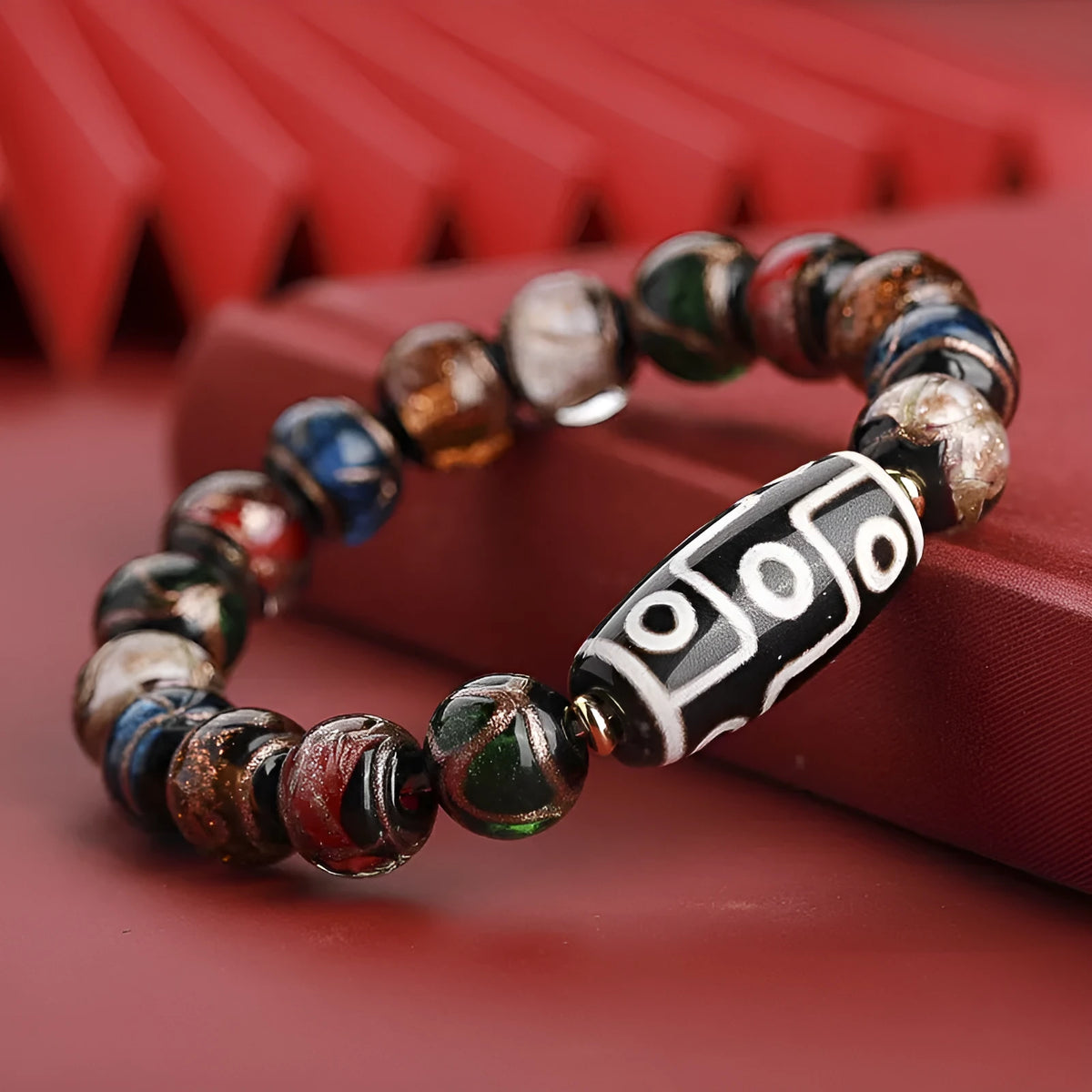 Chinese coloured glaze bracelet with five-colour snake motif lucky beads