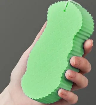 White 3D bath sponge with fish scale pattern for gentle body exfoliation