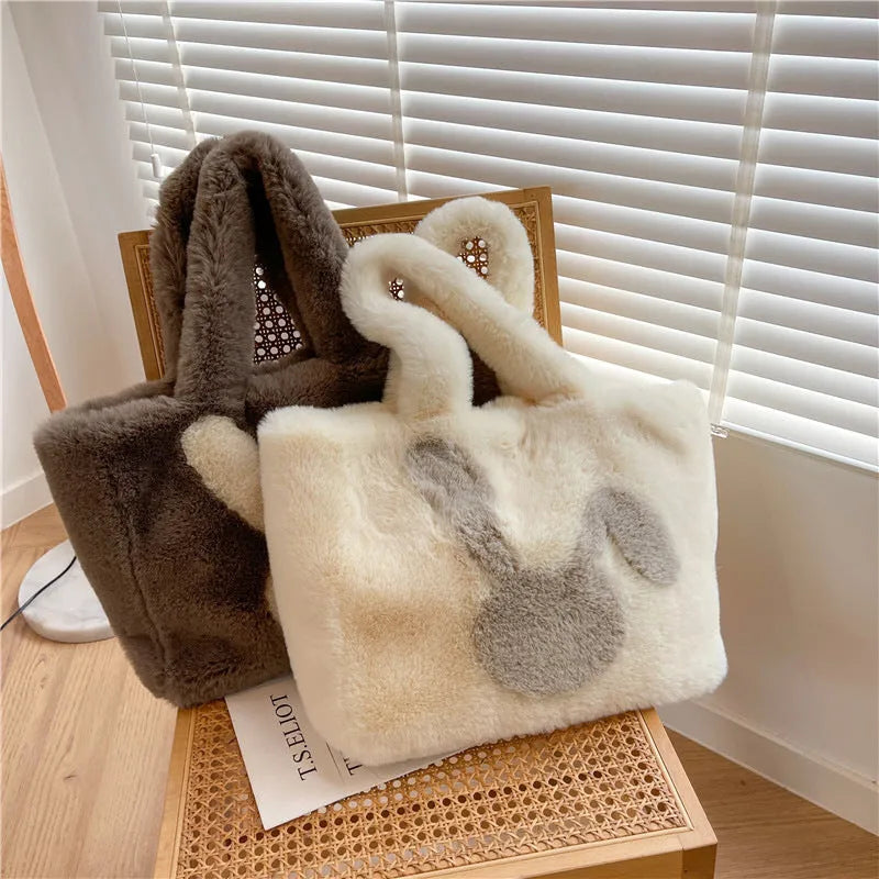 Plush shoulder bag with cartoon rabbit ears in solid colour with shoulder strap