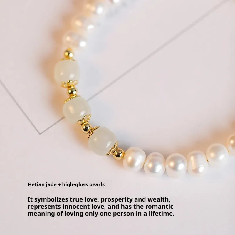 Diamond-shaped freshwater pearl bracelet in electroplated Hetian jade colour on a wrist.