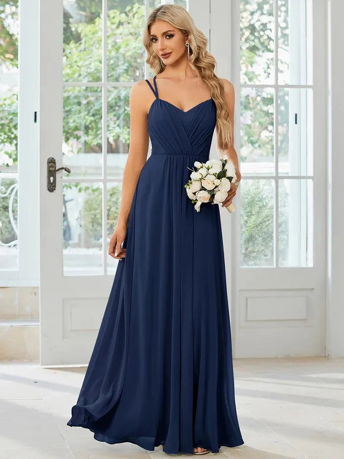 Women's long pleated A-line dress in polyester fabric, sleeveless design available in multiple colours