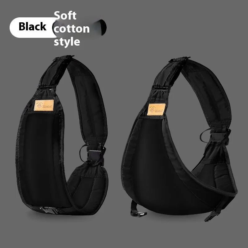 Cloth baby waist stool carrier worn around adult's waist, supporting a child.