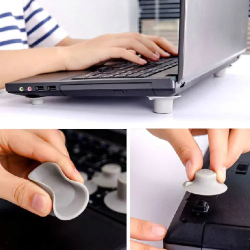 Two large and two small grey plastic laptop cooling pads on a flat surface.