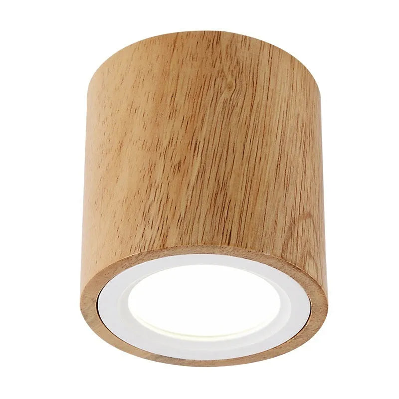 Solid wood surface mounted downlight in wood colour with round and square shape options