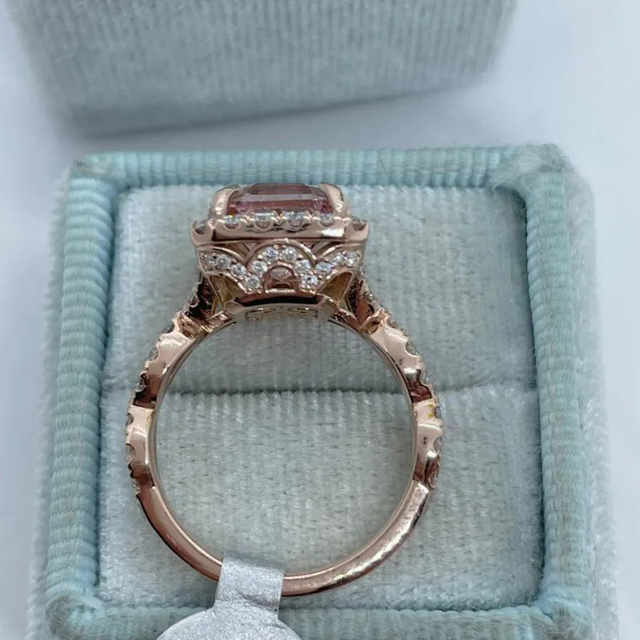 Geometric rose gold electroplated alloy ring shown in structured design