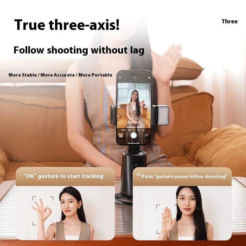 Black ABS desktop phone holder with face tracking, rotating camera head, and built-in LED ribbon lights.