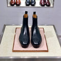 Men's black leather high-top business casual shoes on a white background.