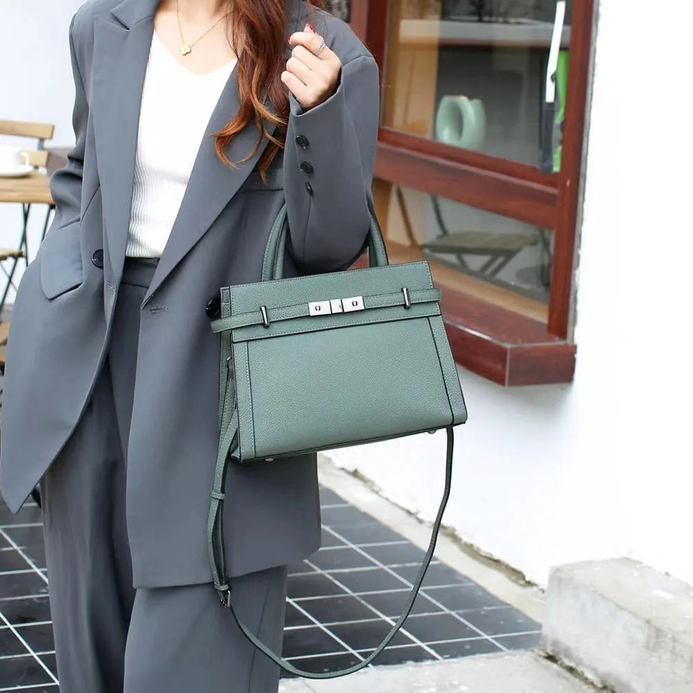 Genuine leather shoulder bag in horizontal square shape with multiple compartments and sandwich pocket design