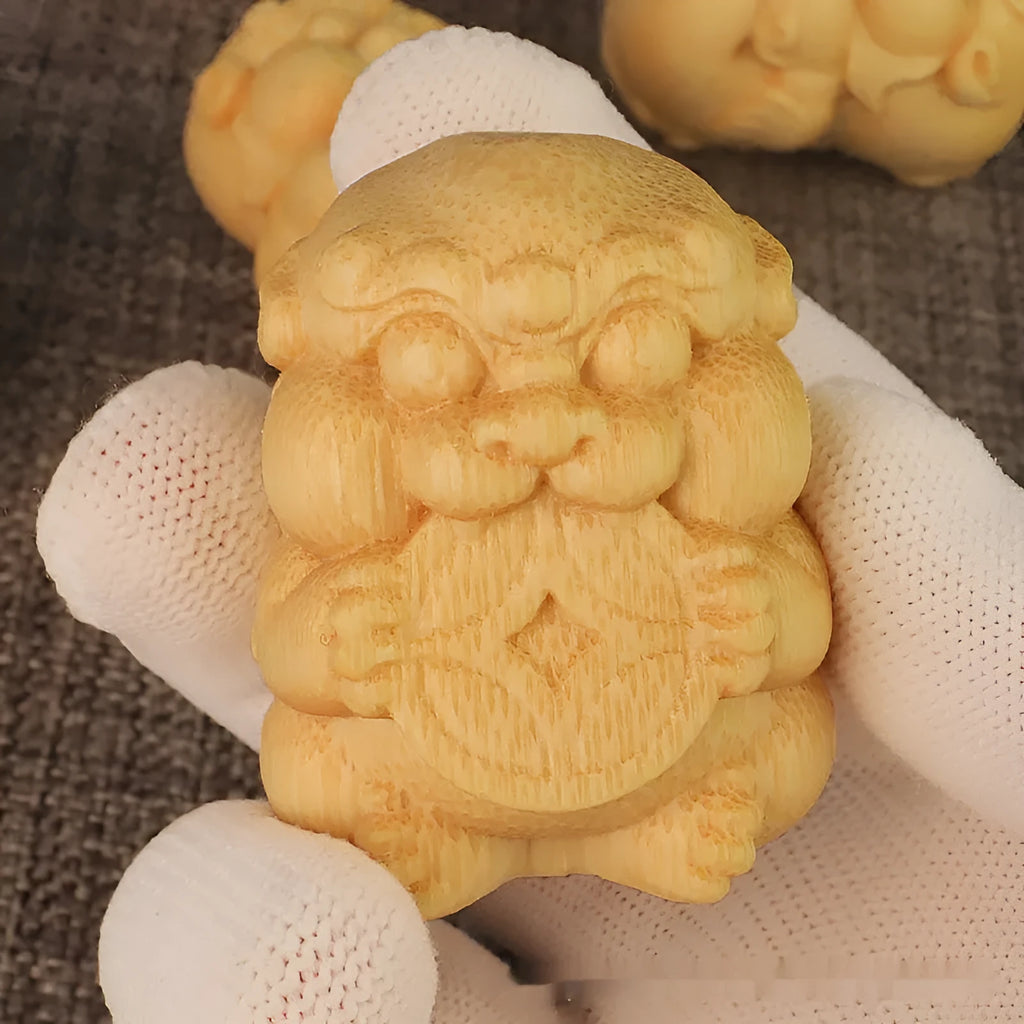 Solid bamboo carving ornament in traditional money shape measuring 4.5cm tall