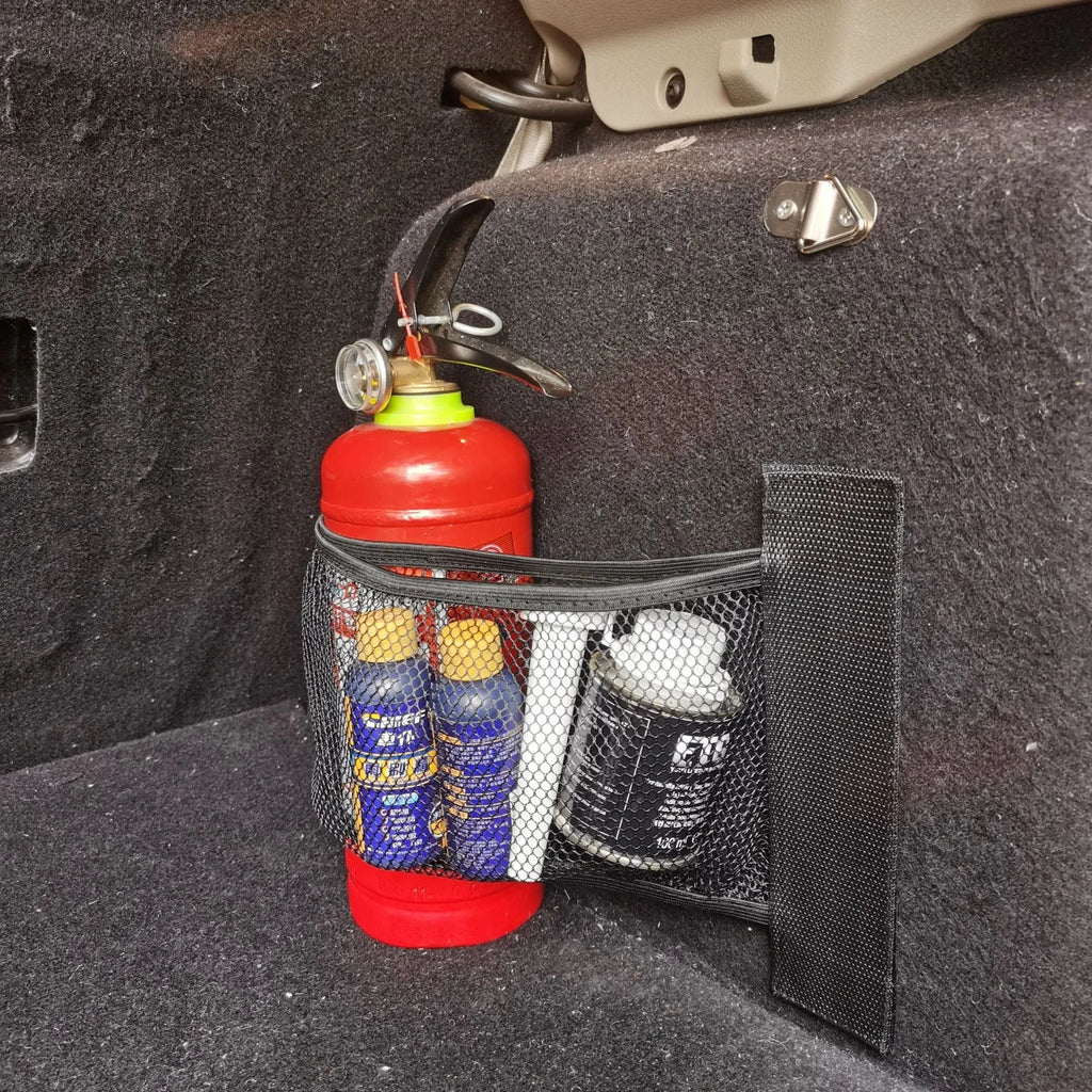 Elastic polyester mesh car boot storage organiser net shown in a vehicle trunk.