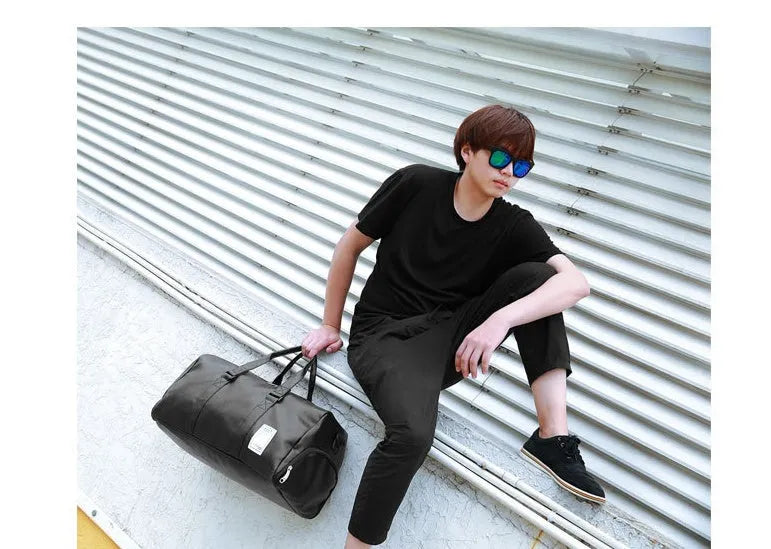 Black waterproof sports fitness bag with separate shoe compartments shown in two size options