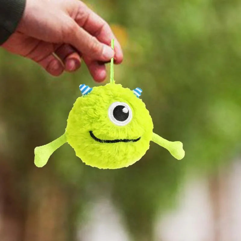 Green interactive dog teething ball toy with sound activation feature for chewing play