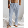 Men's light blue cotton-linen summer trousers with elastic drawstring waist and straight loose leg.