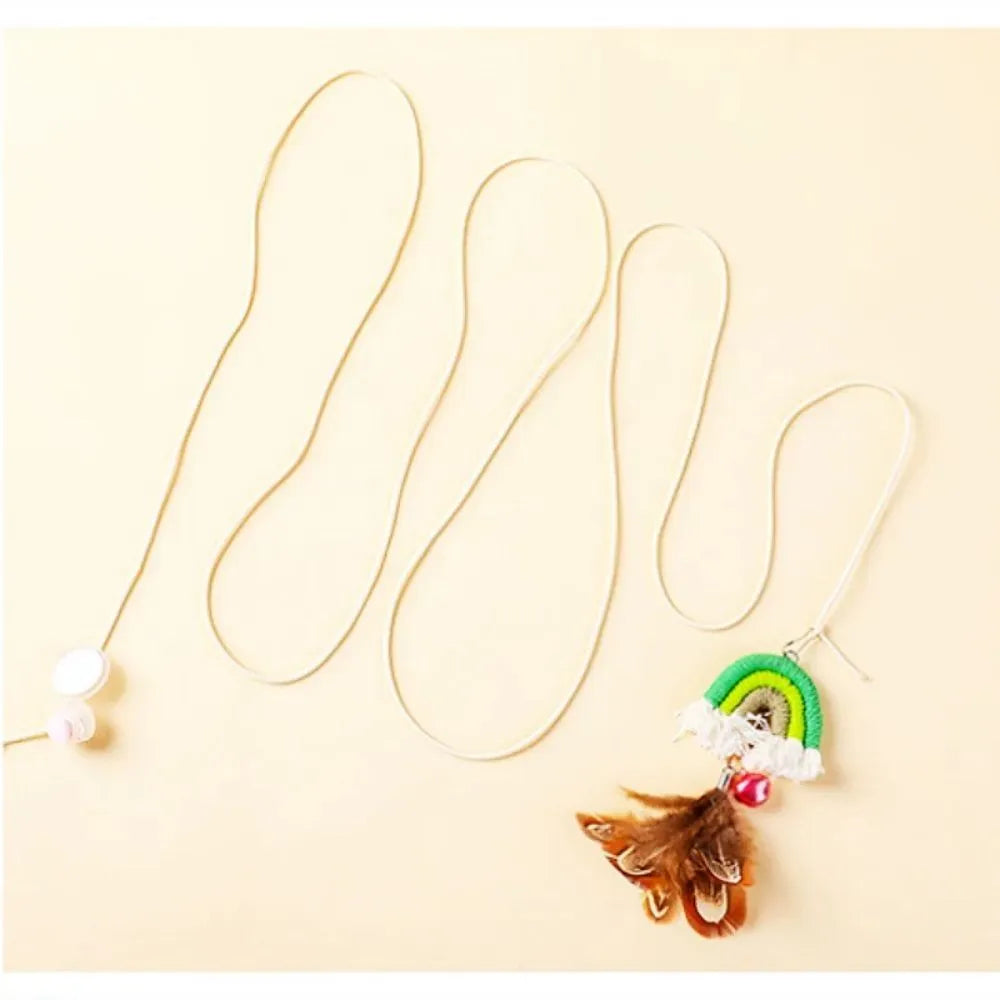 Blue feather cat rope toy hanging from door with elastic swing design and sticky buckle clamp
