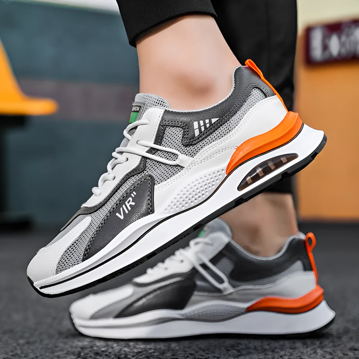Men's grey mesh casual shoes with round toe and mid-top height design