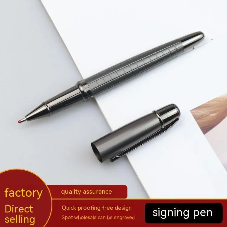 Grey metal roller pen with gun-shaped barrel on white background