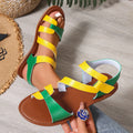 Women's flat sandals with Velcro strap, round toe, and a brown PU upper on a rubber sole.