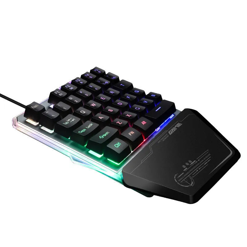 Black G40 one-handed mechanical gaming keyboard with RGB backlit keys on a desktop