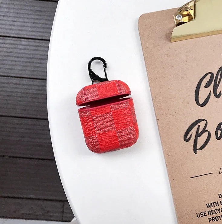 Plastic hard shell iPhone XS MAX case with a grid pattern and an integrated anti-lost hook for Bluetooth headsets.