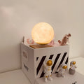 Maglev floating planet night light with moon, earth, and astronaut decorations illuminated by LED