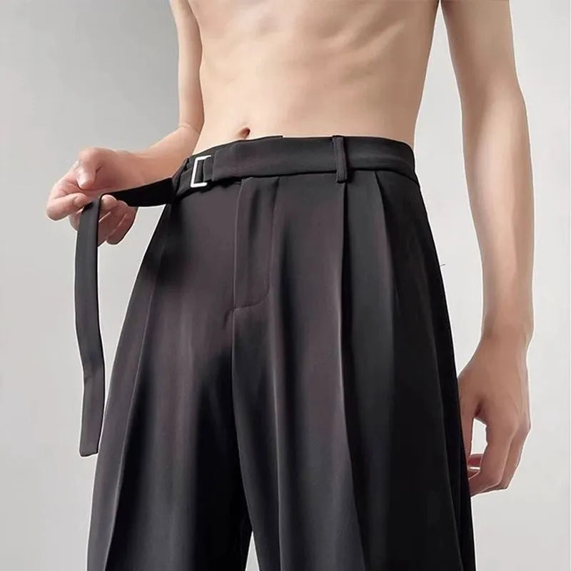 Straight-leg wide-leg trousers in black, made from a thin chemical fibre blend fabric.