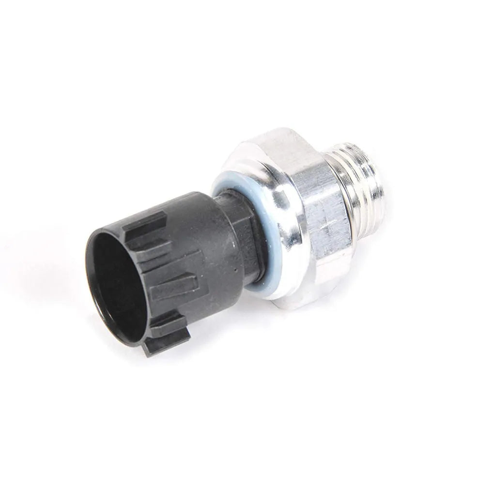 Silver automobile fuel pressure sensor for petrol engine diagnostic testing.