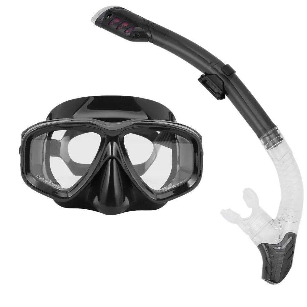 Black diving goggles with clear anti-fog lens, PC frame, and blue silicone skirt on an adjustable strap.