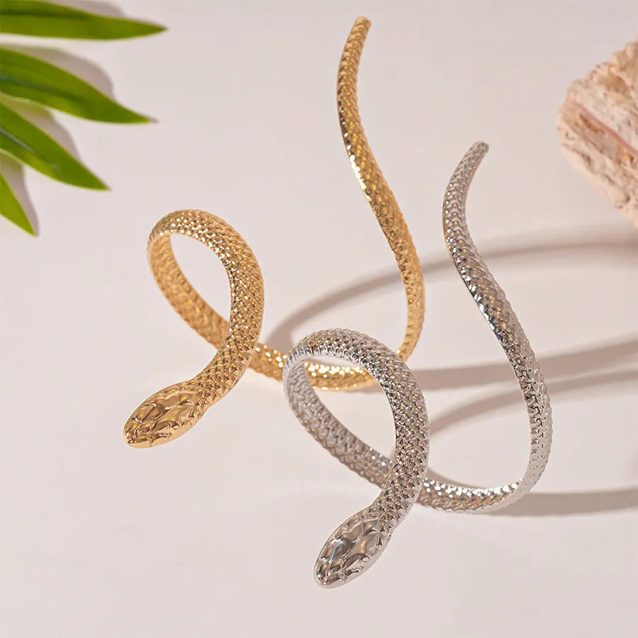 Exaggerated twisted winding simulated snake metal ring and bracelet jewellery set in gold and silver electroplated finishes