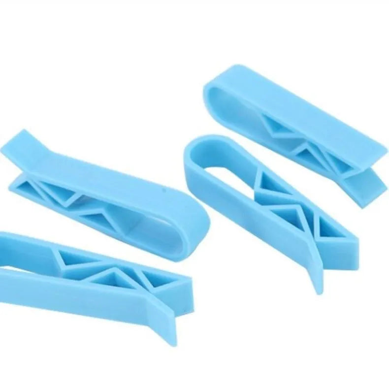 Grey PP plastic non-slip clip for securing bin bags to a rubbish bin rim.