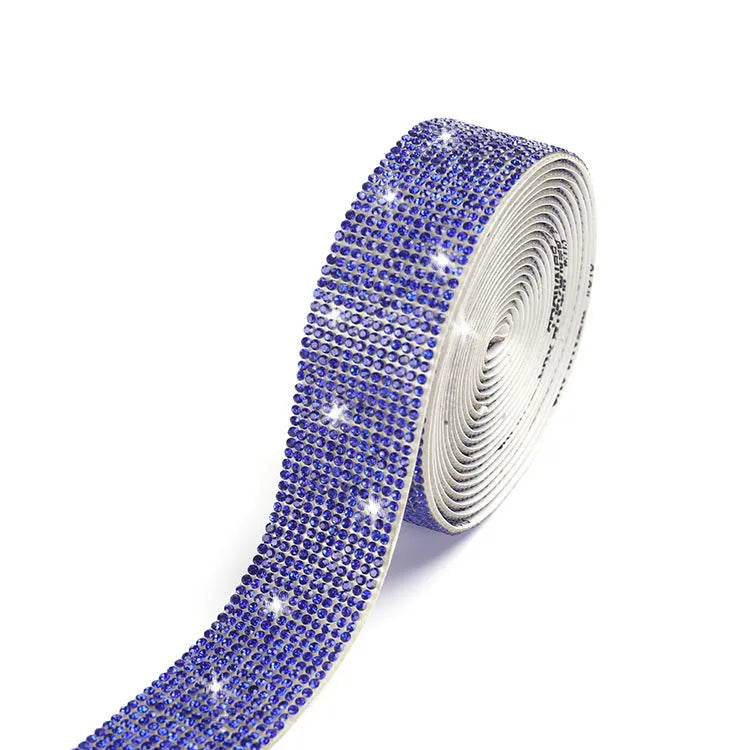 A long strip of self-adhesive glass rhinestones for hot-fix application on clothing and shoes.