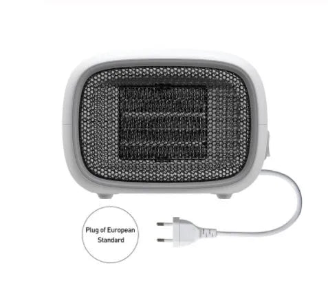 Mini portable electric heater in green colour with compact rectangular design for desk or bedside use
