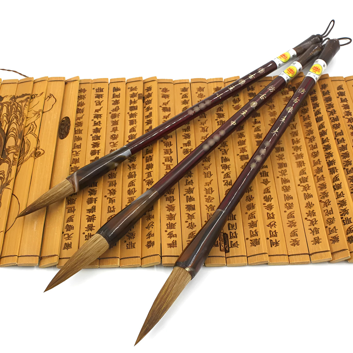Wolf hair Chinese calligraphy brush with steel rod, shown in large, medium, and small block sizes.