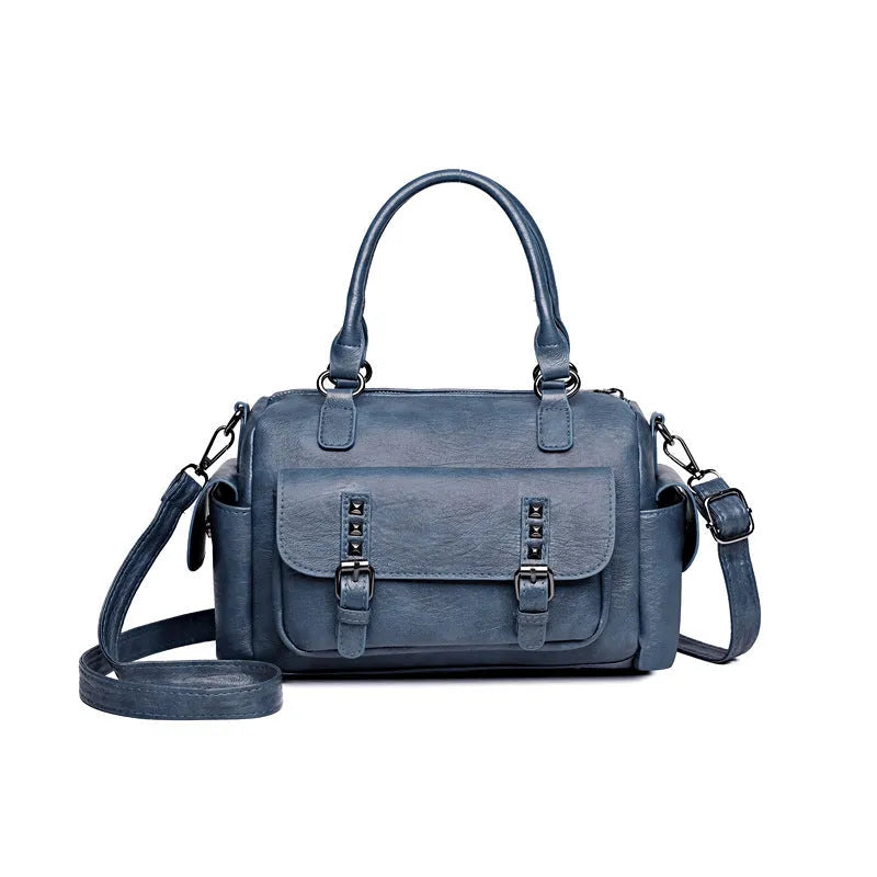Vintage messenger bag in horizontal square shape with contrast stitching, shown in available colour options