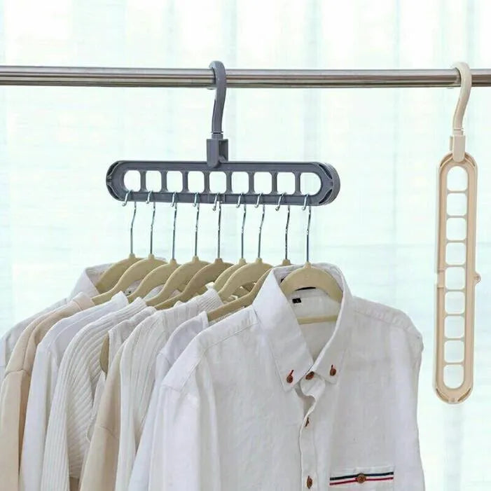 Plastic clothes hanger with rotating hook in pink or green colour for heavy garment storage